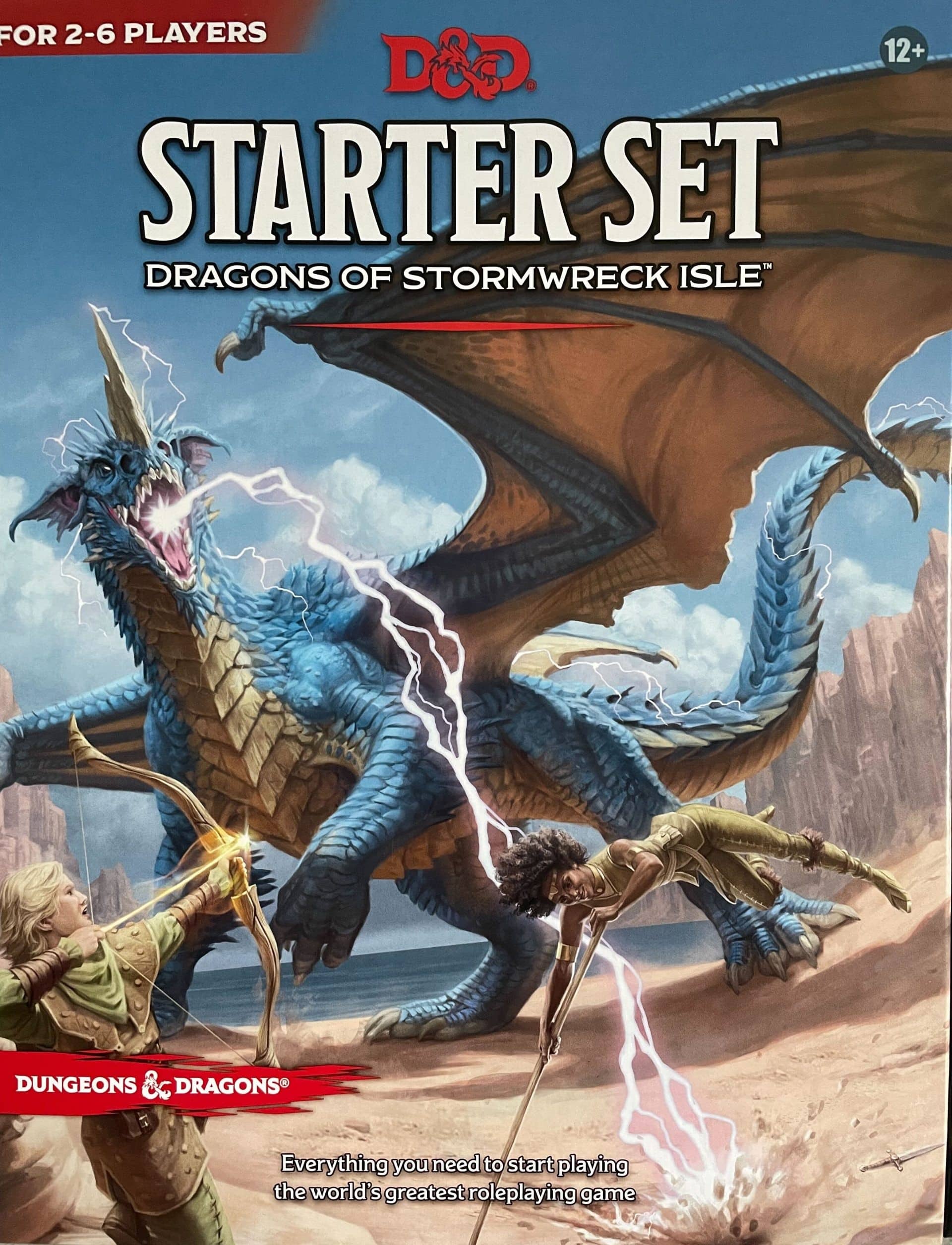 Dungeons & Dragons Aloituspaketti Stormwreck Islandin lohikäärmeistä, kansikuvassa sankarit ja sininen lohikäärme
